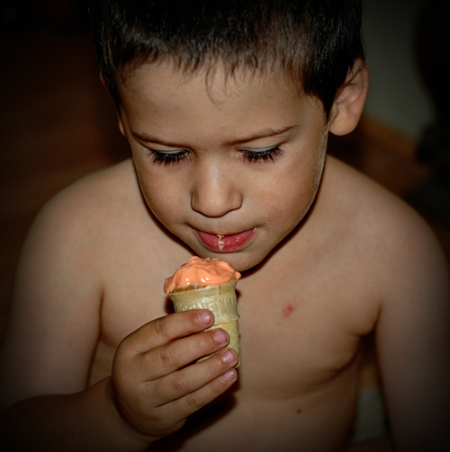 Little Man eating Cupcake Cone