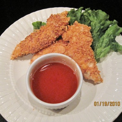 Tangy Oven Fried Chicken Tenders with Hot Honey Drizzle